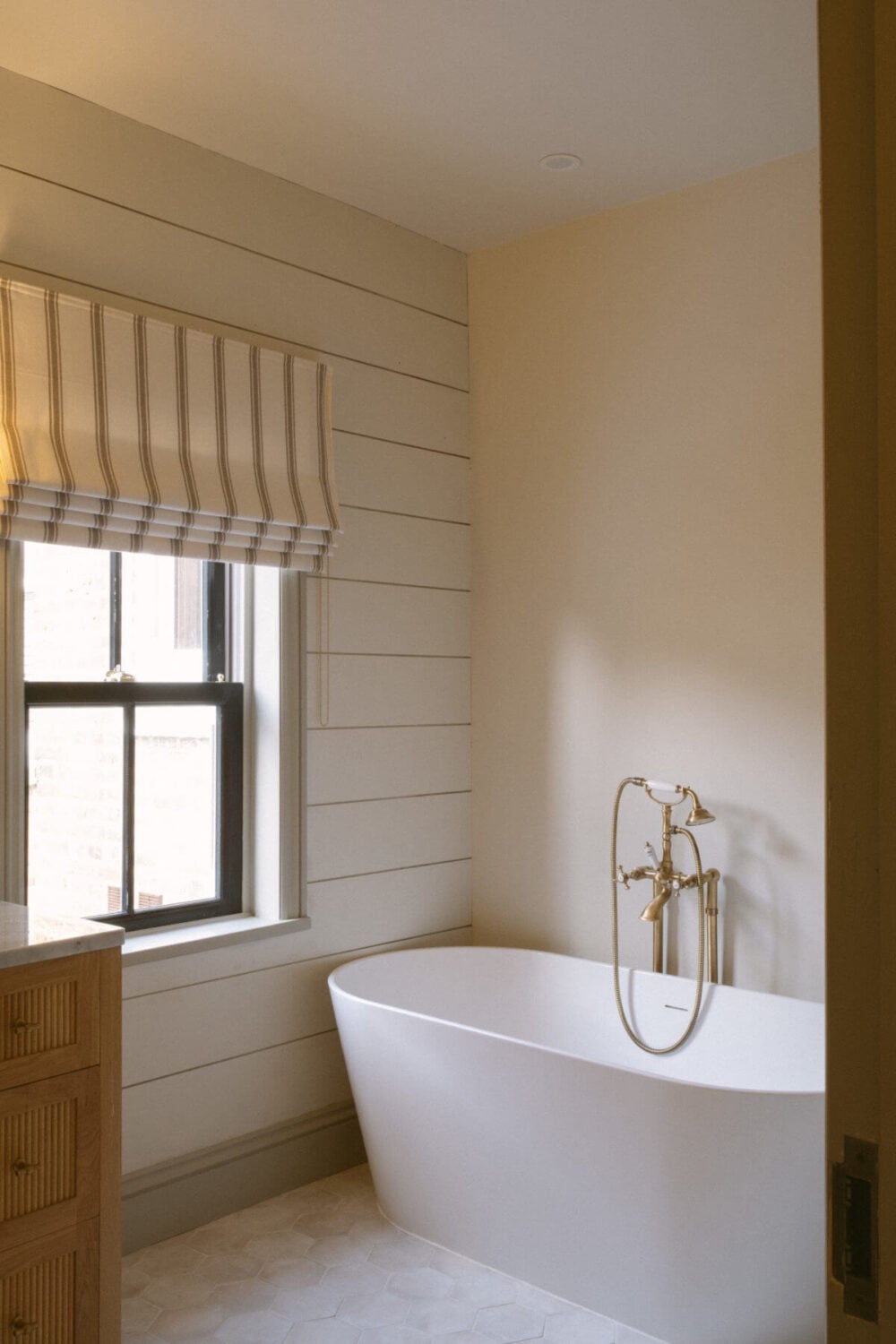 A Serene Renovated Victorian House in London 25 bathroom-wooden-wall-freestanding-bath-nordroom