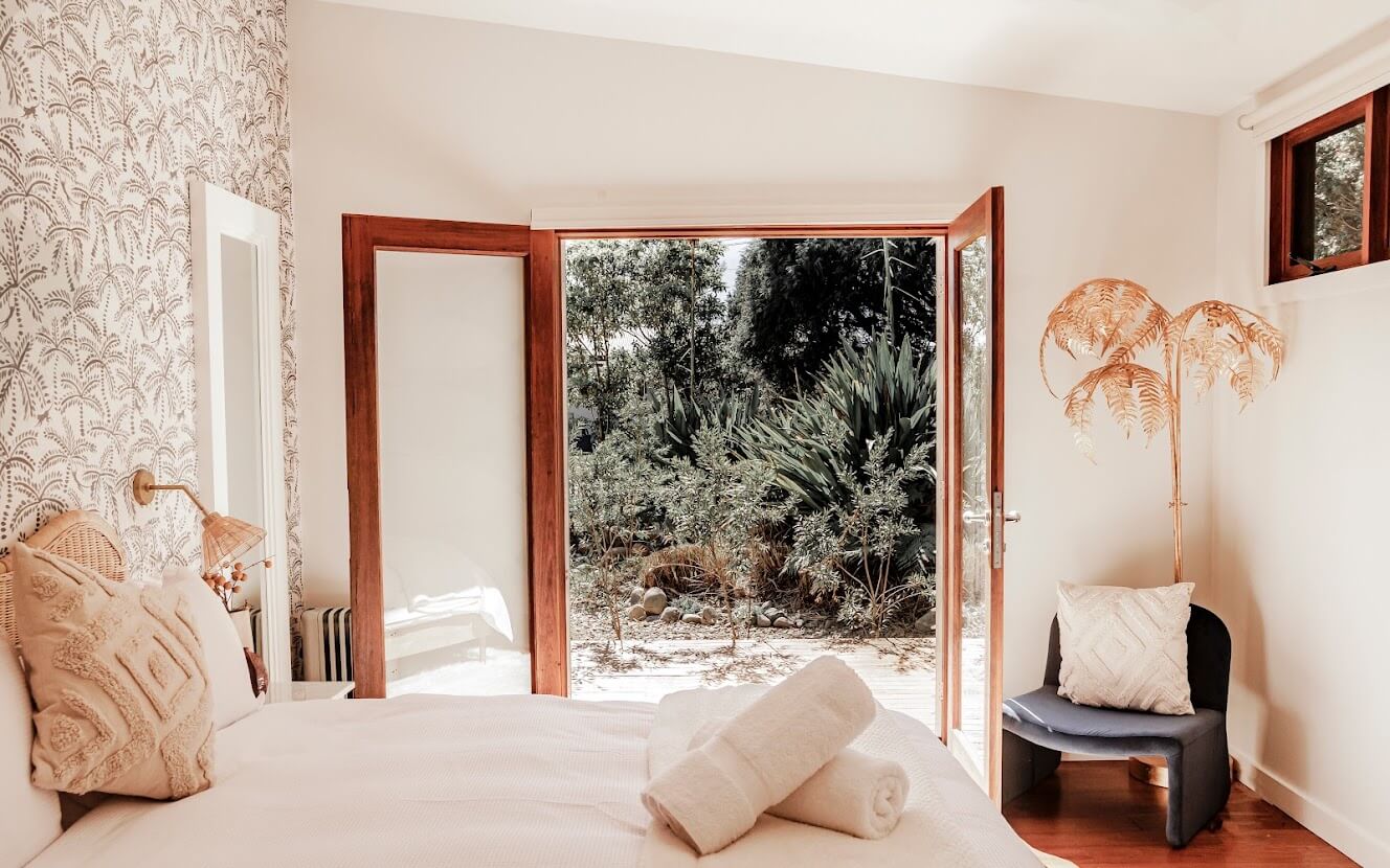 Oyster Catcher Huskisson: A Sustainable Beach House in Australia 18 bedroom-double-doors-terrace-wallpaper-nordroom