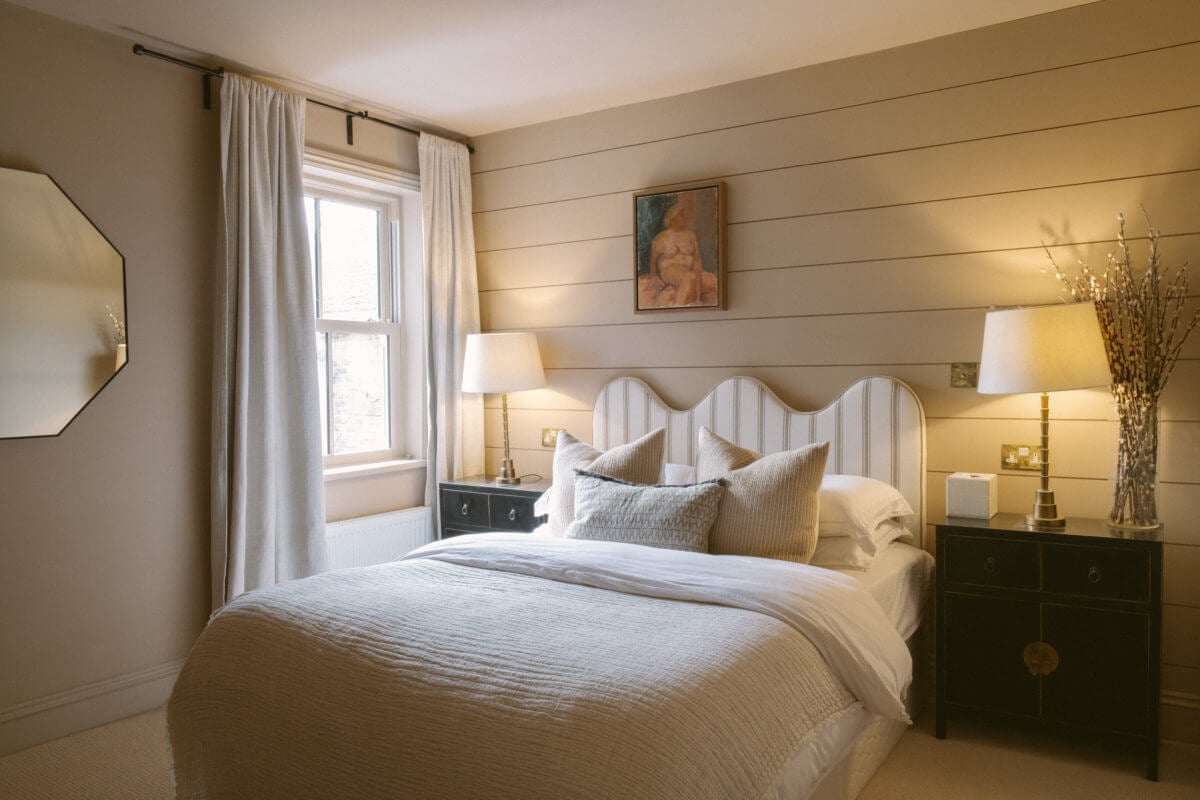 A Serene Renovated Victorian House in London 28 bedroom-gray-wooden-walls-curved-headboard-nordroom