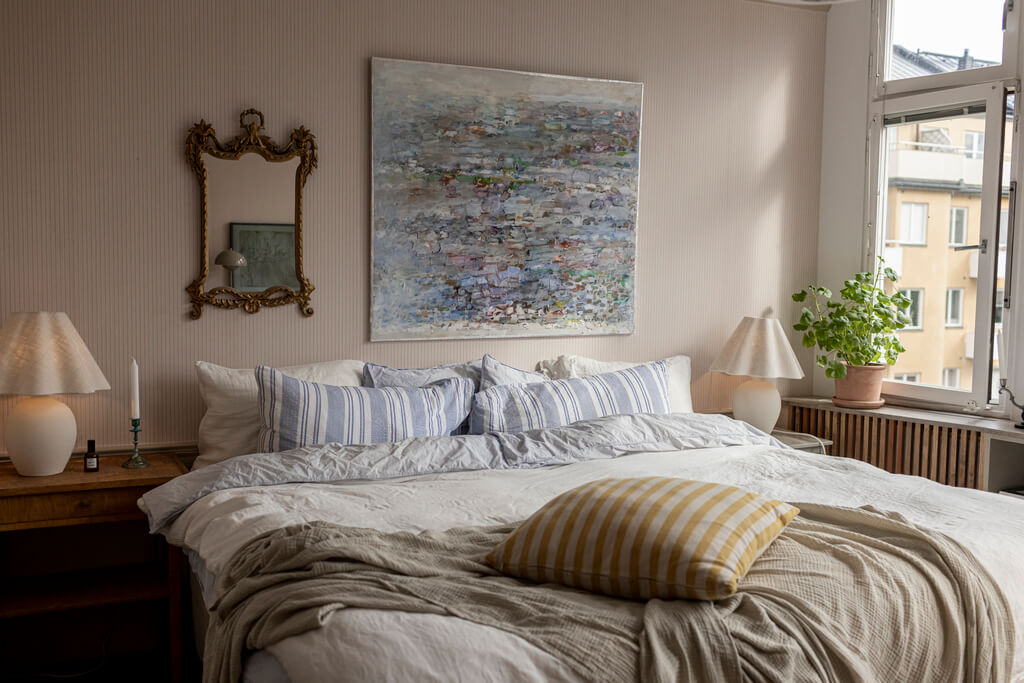 A Scandinavian Apartment with Antique Furniture 9 bedroom-striped-wallpaper-antique-furniture-nordroom