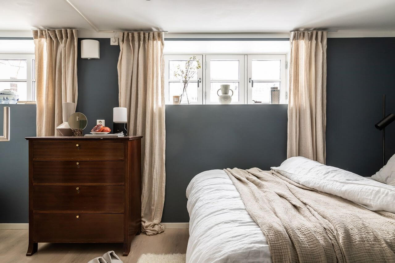 Soft Neutral Colors in a Norwegian Maisonette Home 13 blue-walls-basement-bedroom-nordic-design-nordroom