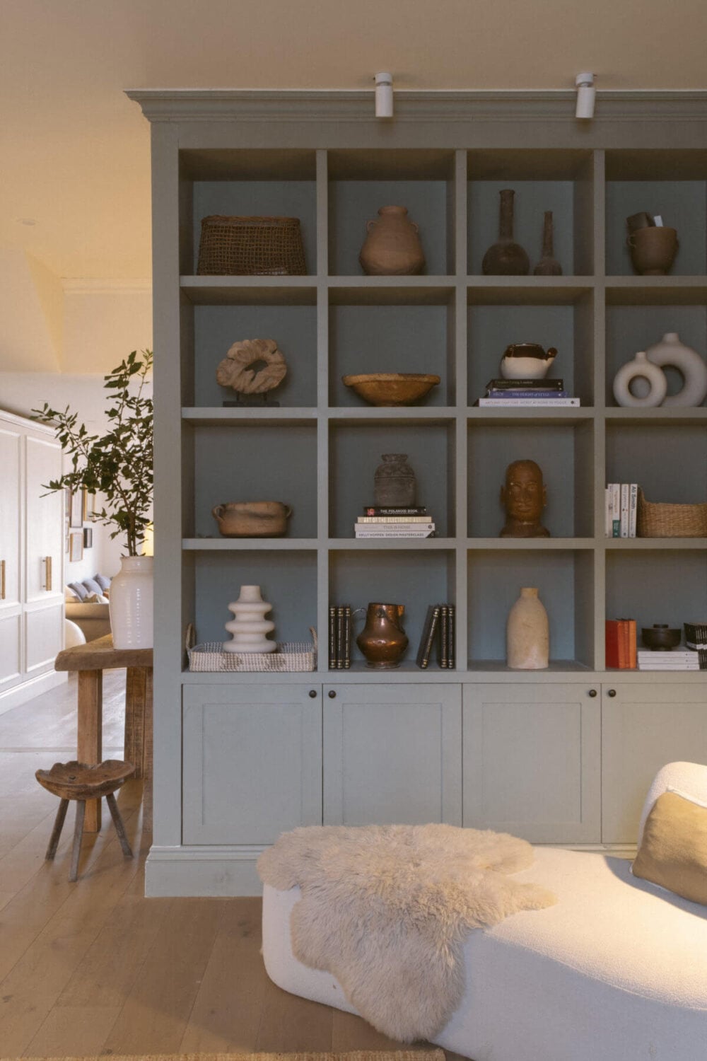 A Serene Renovated Victorian House in London 6 built-in-bookcase-display-lounge-chair-nordroom