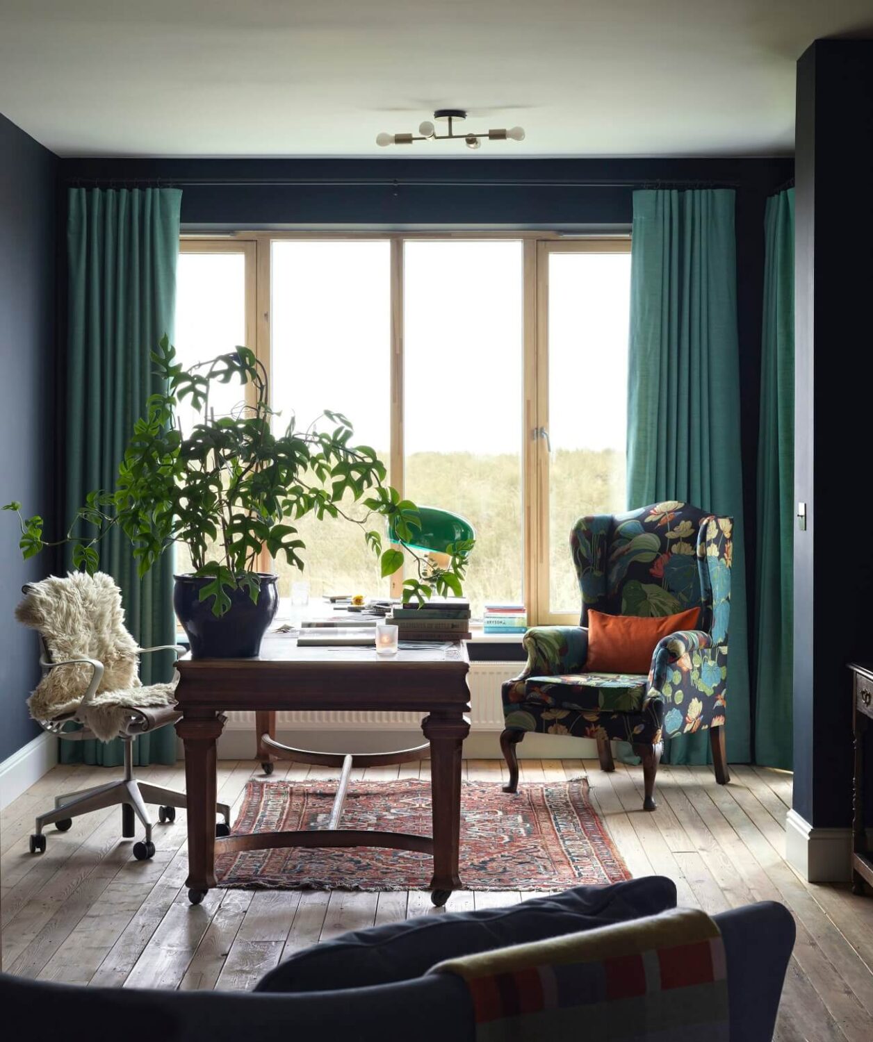 A Colorful House By The Sea Designed by Space A 6 colorful-home-office-antique-desk-blue-walls-nordroom
