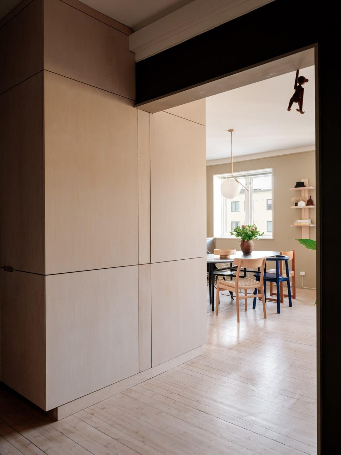 A Modern Oslo Apartment with Custom Furniture and Storage 17 custom-storage-cabinets-scandinavian-apartment-nordroom