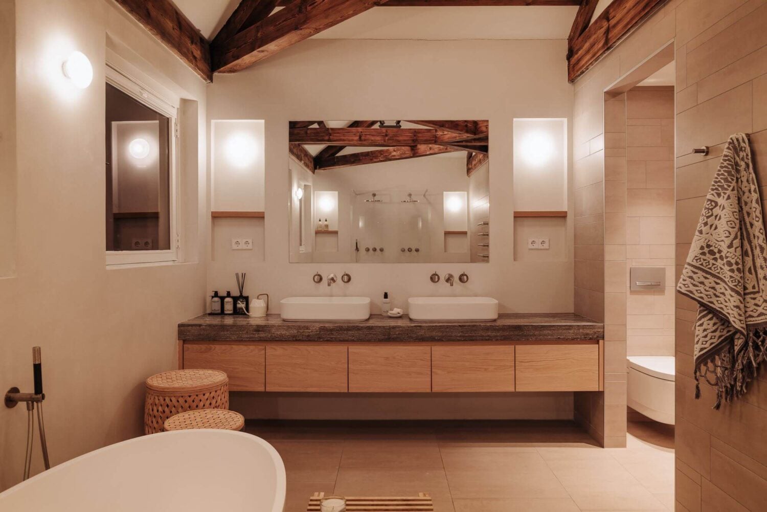 A Luxurious Canal Home in Amsterdam 16 double-built-in-sink-wooden-beams-freestanding-bath-nordroom