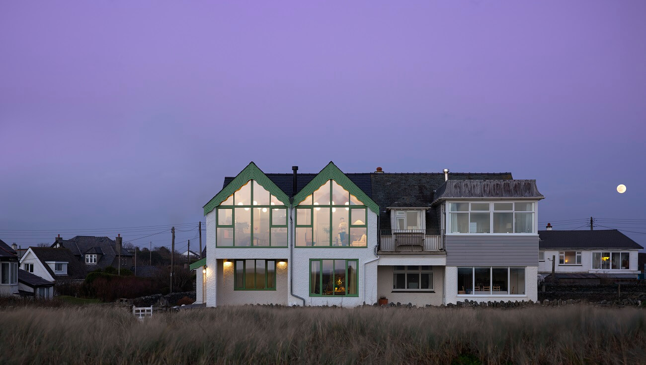 A Colorful House By The Sea Designed by Space A 16 exterior-glass-walls-pitched-roof-house-by-the-sea-space-a-nordroom