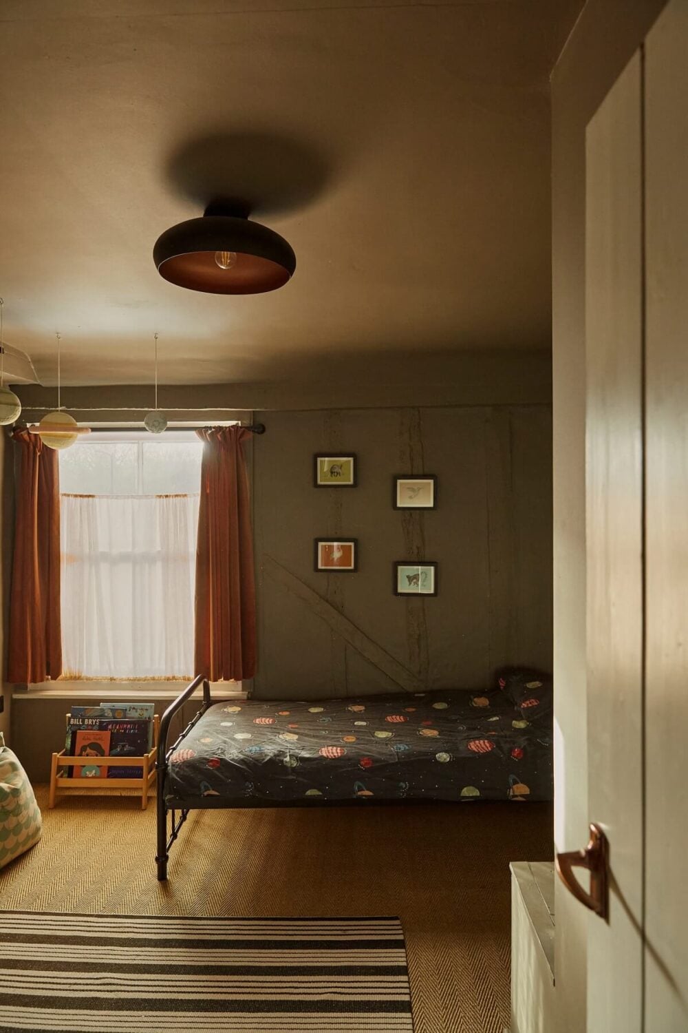A Pink English Home That's Brimming with History 20 gray-kids-bedroom-wooden-walls-historic-home-nordroom