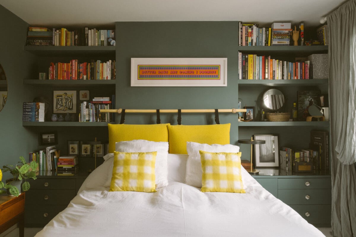 A Victorian House in London Decorated in Warm Color Tones 25 green-bedroom-bookshelves-yellow-color-accents-nordroom