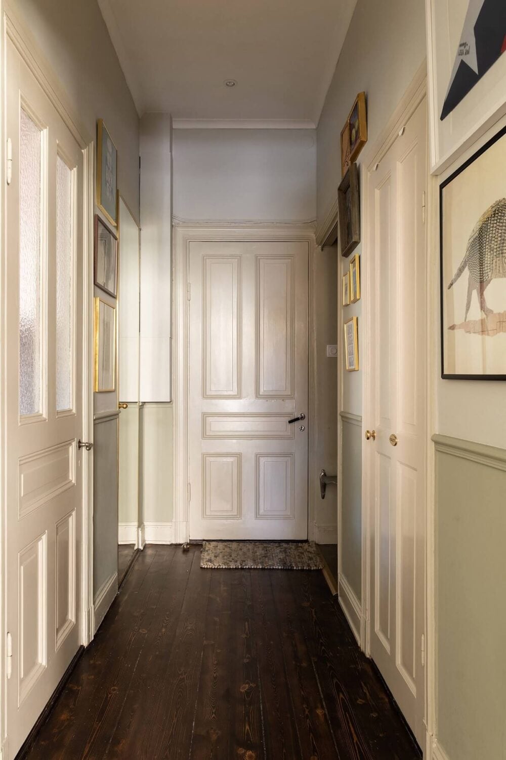 A Classic Maisonette Home in Stockholm 25 hallway-dark-wooden-floor-nordroom