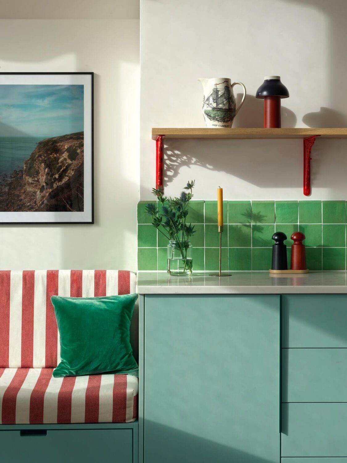 50+ Rooms That Prove ‘The Unexpected Red Theory’ Really Works 56 kitchen-close-up-modern-blue-cabinets-green-backsplash-tiles-striped-red-bench-nordroom
