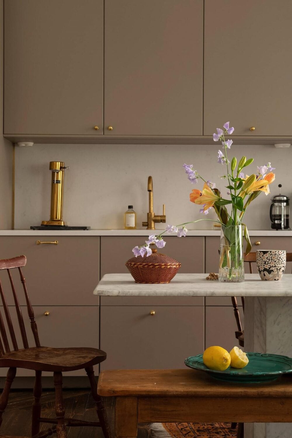 A Classic Maisonette Home in Stockholm 4 kitchen-gray-cabinets-brass-fixtures-nordroom