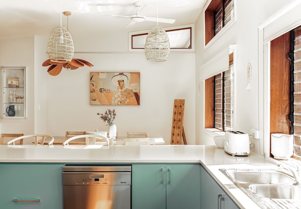 Oyster Catcher Huskisson: A Sustainable Beach House in Australia 7 kitchen-light-blue-cabinets-beach-house-nordroom
