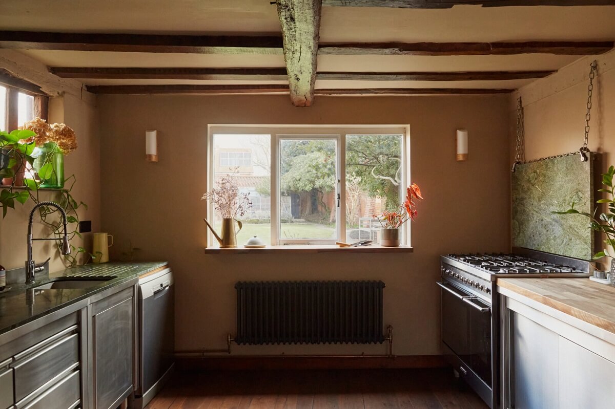 A Pink English Home That's Brimming with History 10 kitchen-low-ceiling-wooden-beams-historic-home-nordroom