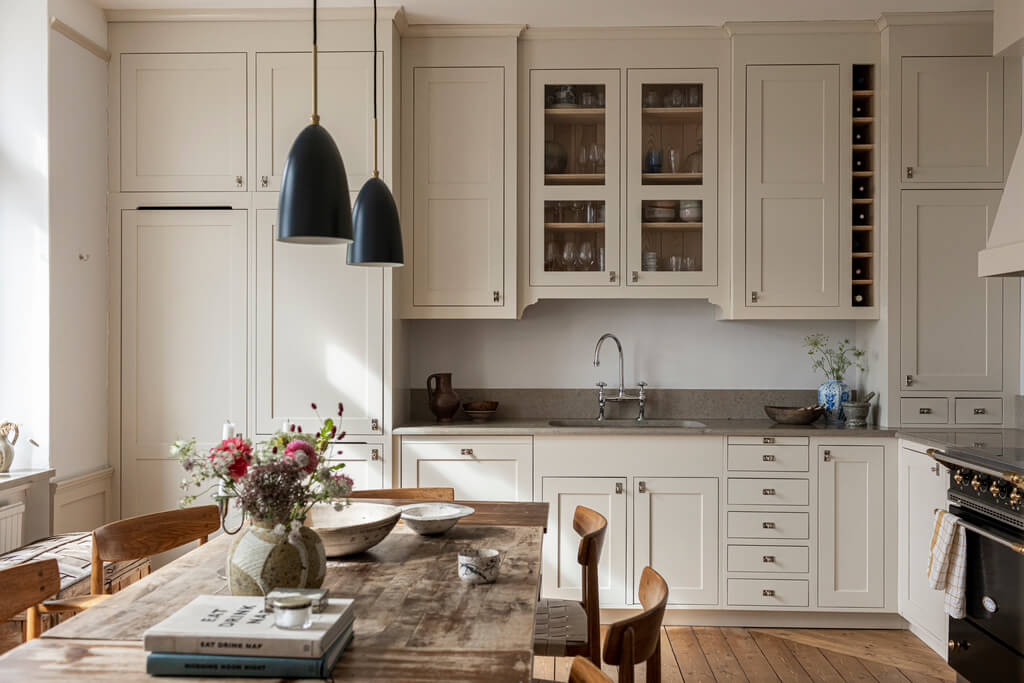 A Scandinavian Apartment with Antique Furniture 7 kitchen-rustic-wooden-table-nordic-apartment-nordroom