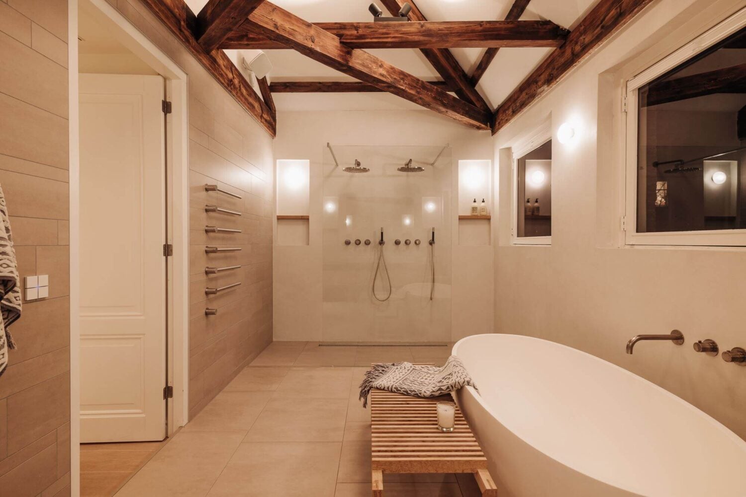 A Luxurious Canal Home in Amsterdam 15 minimalistic-bathroom-freestanding-bath-exposed-wooden-beams-nordroom