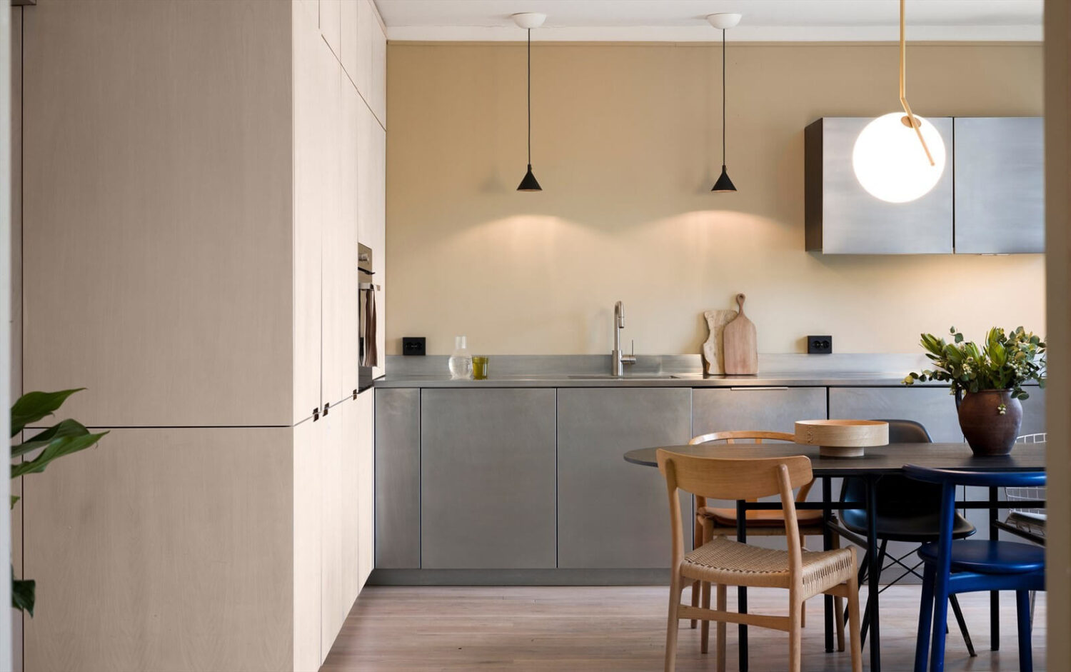 A Modern Oslo Apartment with Custom Furniture and Storage 8 modern-apartment-stainless-steel-kitchen-nordroom