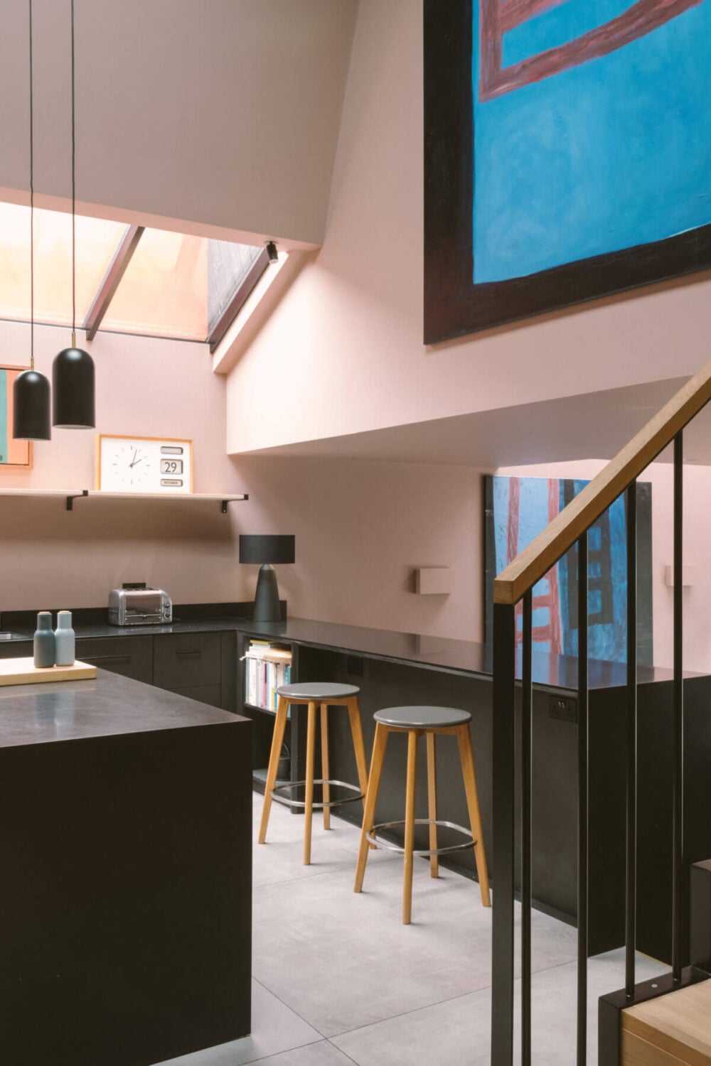 A Modern Split-Level Home with Colorful Rooms 1 modern-black-kitchen-bar-modern-london-home-nordroom