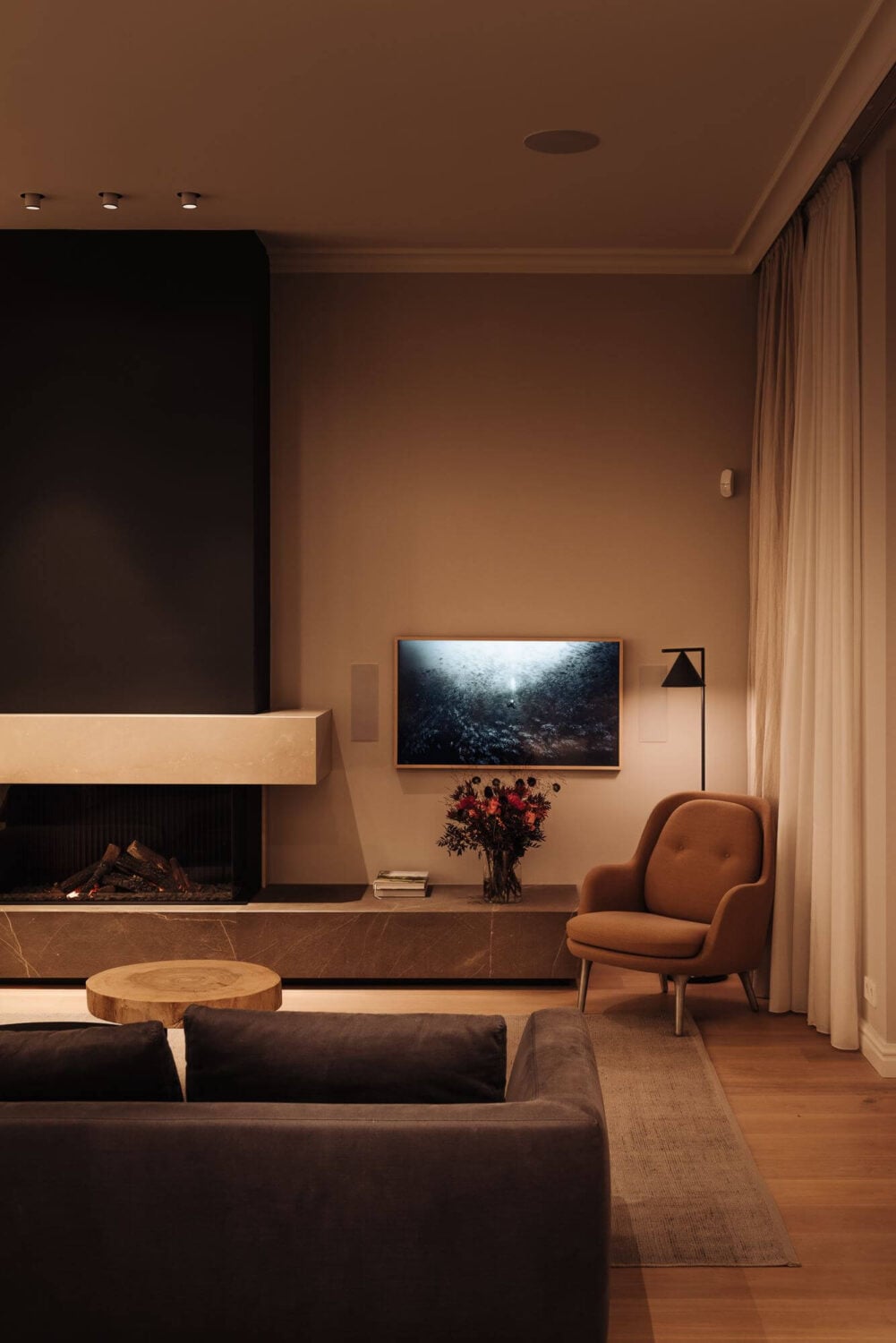 A Luxurious Canal Home in Amsterdam 9 modern-living-room-fireplace-nordroom