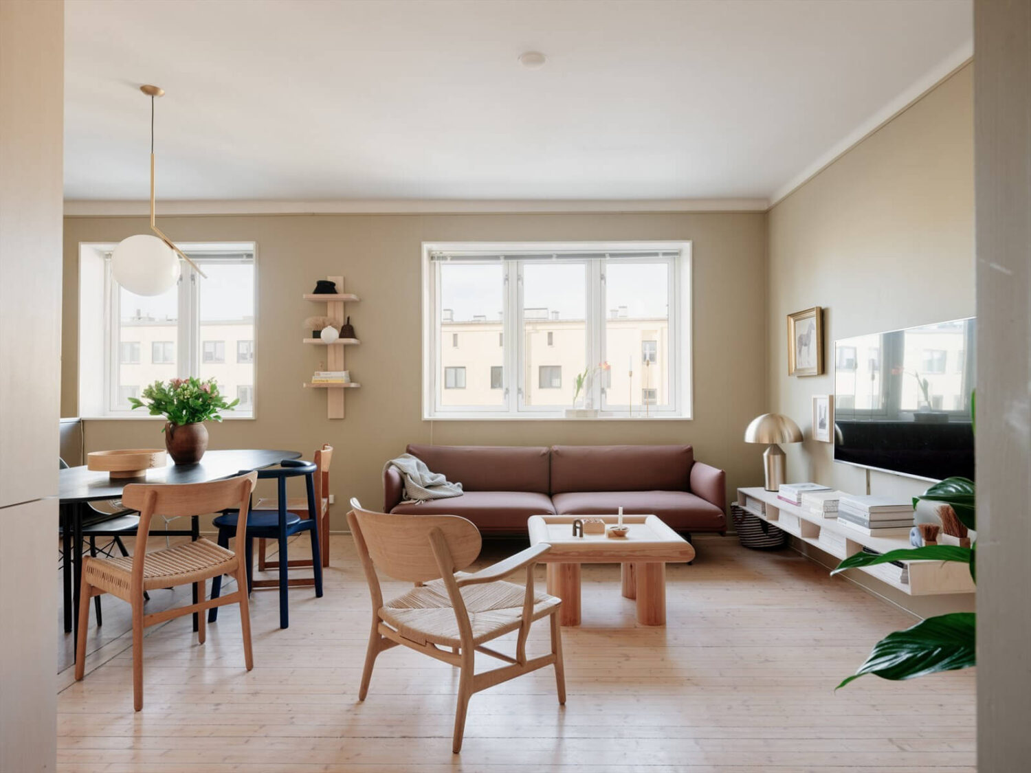 A Modern Oslo Apartment with Custom Furniture and Storage 2 open-plan-scandinavian-living-room-nordroom