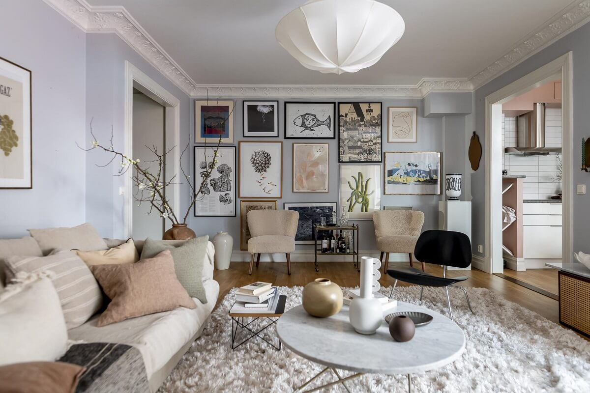Sherwin-Williams Color of the Year 2024: Upward 16 scandinavian-living-room-gallery-wall-large-rug-nordroom