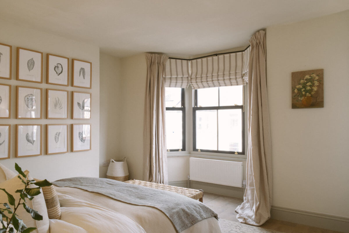 A Serene Renovated Victorian House in London 21 serene-bedroom-bay-window-gallery-wall-nordroom