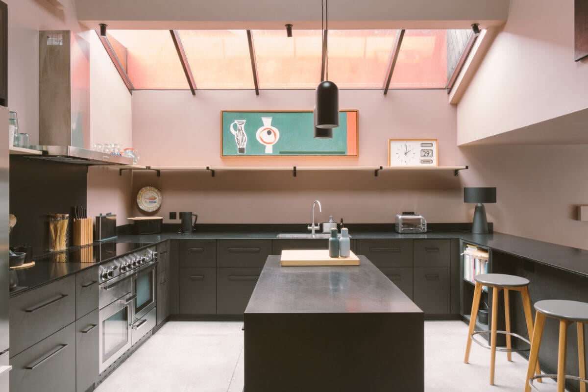 A Modern Split-Level Home with Colorful Rooms 3 sleek-black-kitchen-skylight-split-level-home-london-nordroom