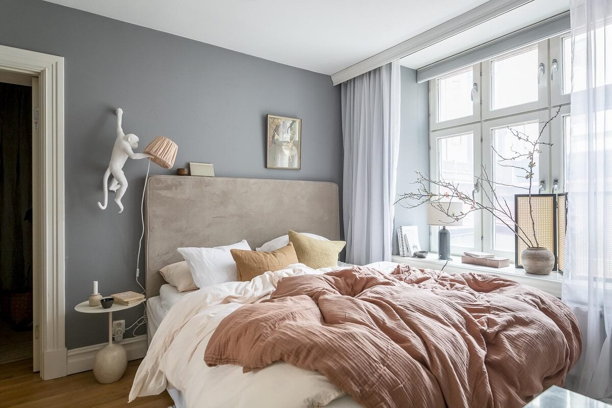 Layered Textiles and Dusty Colors in a Nordic Apartment 14 small-bedroom-scandinavian-design-nordroom