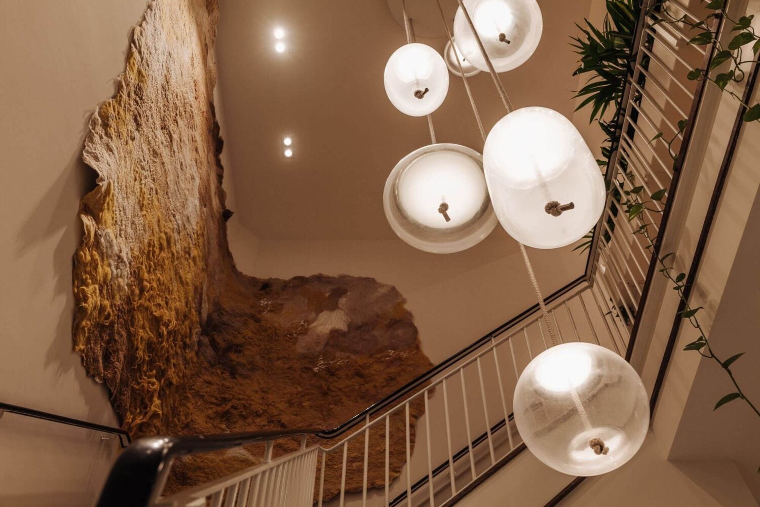 A Luxurious Canal Home in Amsterdam 12 staircase-pendant-lighting-large-art-nordroom