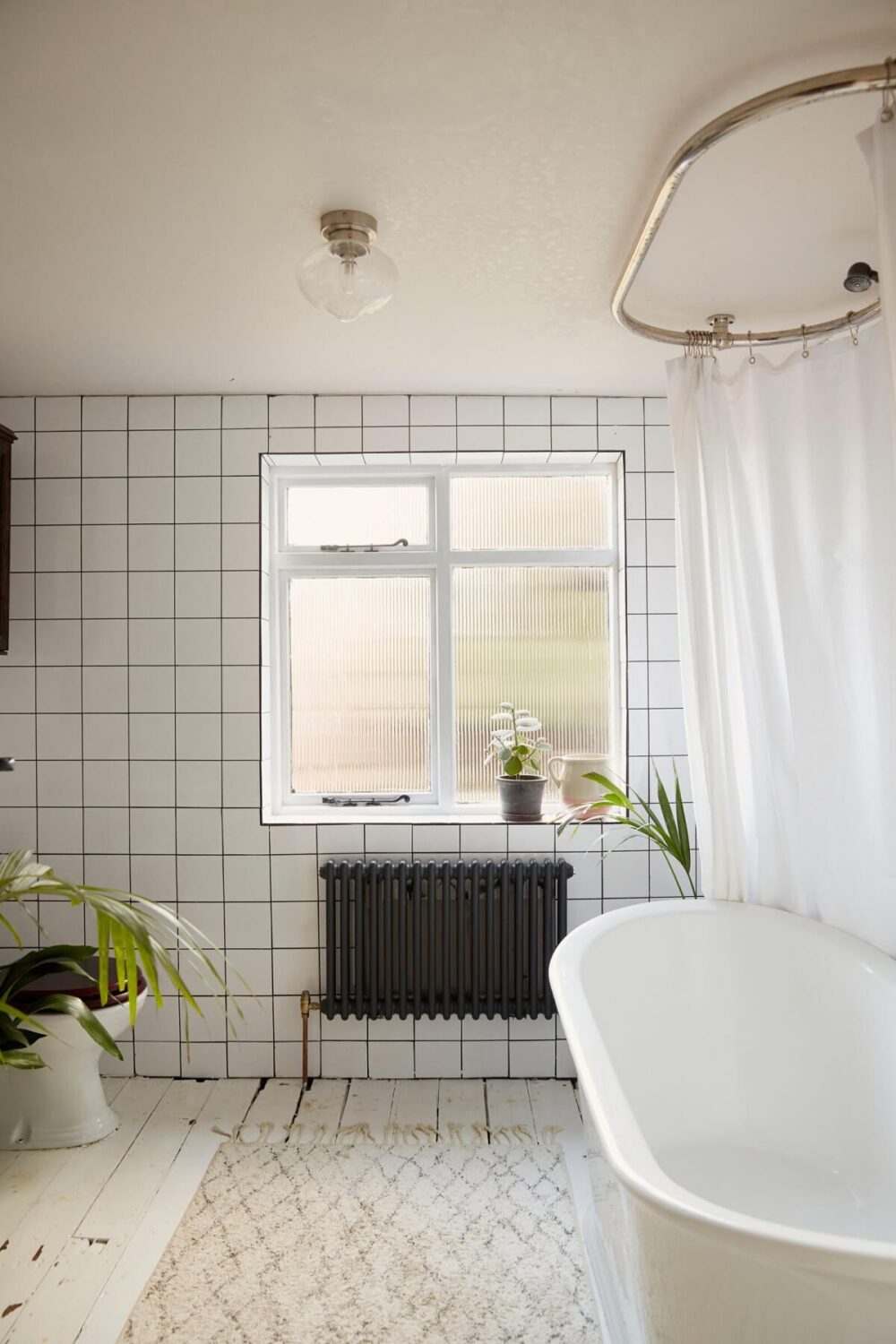 A Pink English Home That's Brimming with History 23 white-bathroom-freestanding-bath-square-tiles-nordroom