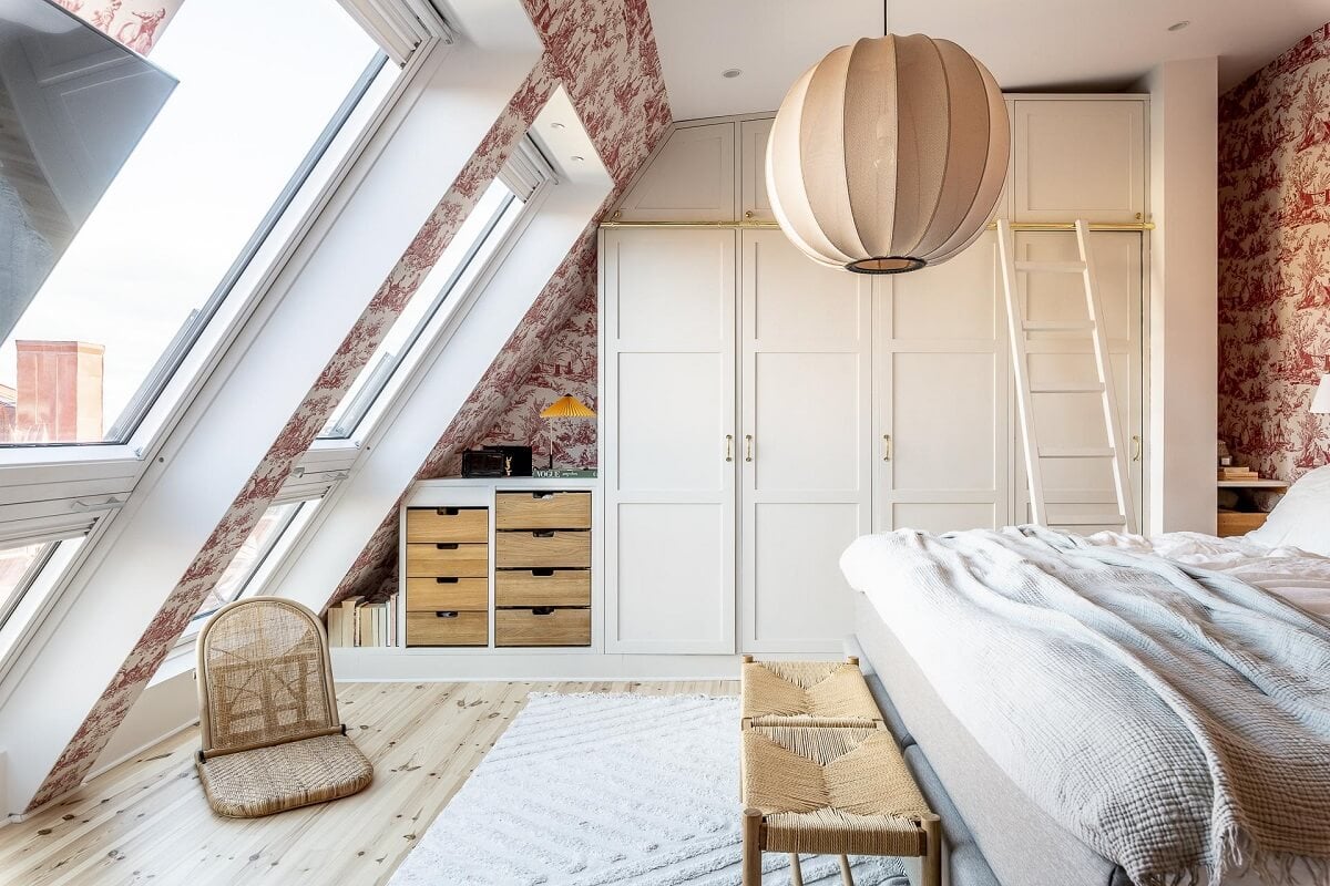 A Swedish Maisonette with a Blue Kitchen and Wallpaper 18 attic-bedroom-large-windows-wallpaper-built-in-wardrobes-nordroom