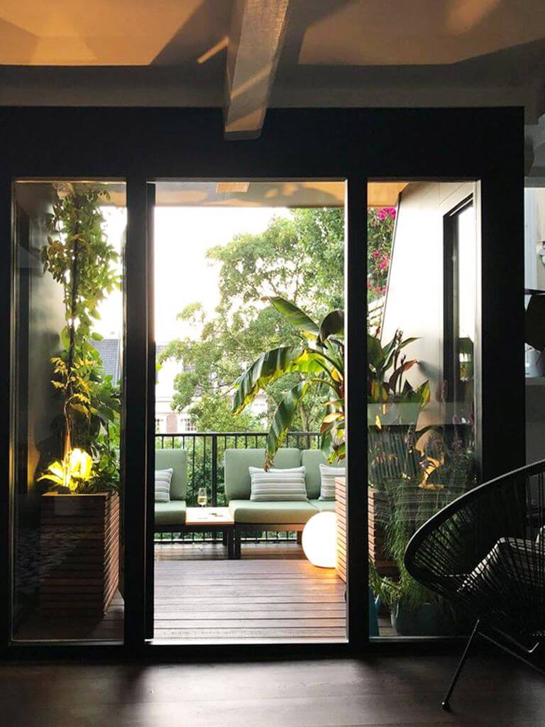An Amsterdam Penthouse with Green Color Accents 6 balcony-roof-terrace-plants-penthouse-amsterdam-nordroom