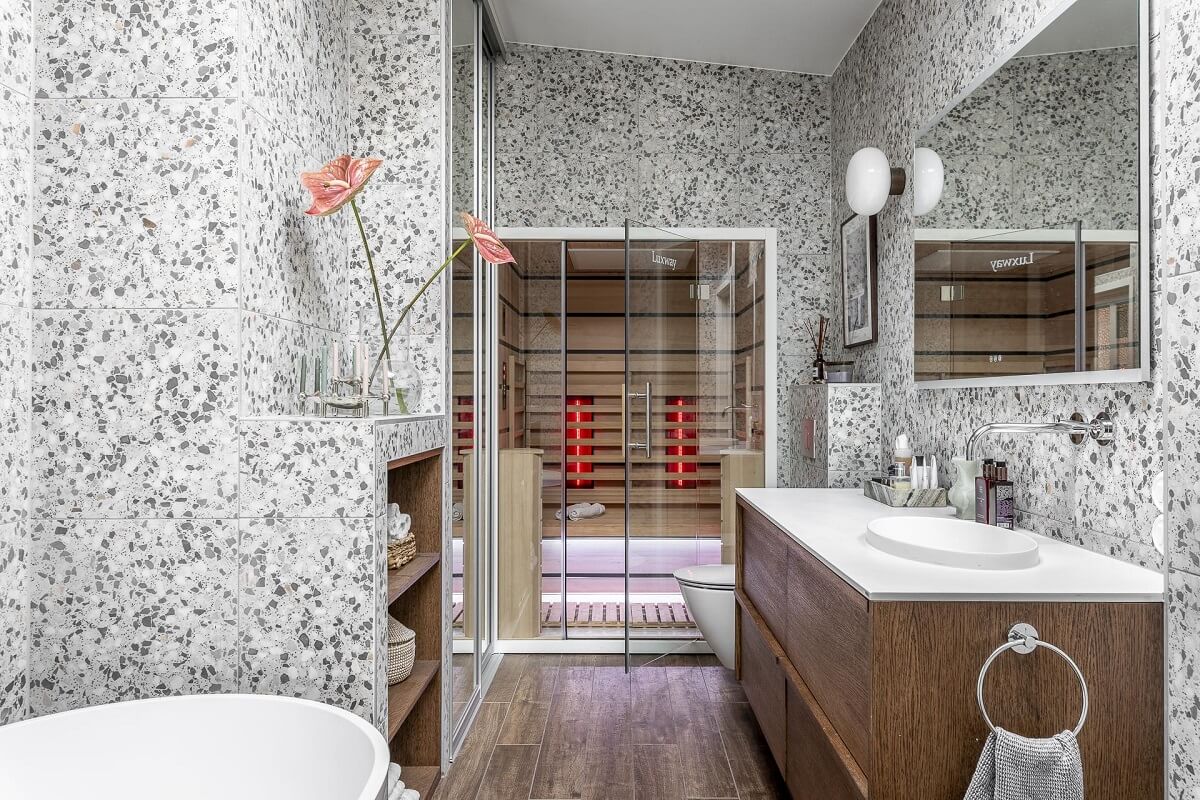 A Swedish Maisonette with a Blue Kitchen and Wallpaper 26 bathroom-terrazzo-tiles-sauna-nordroom