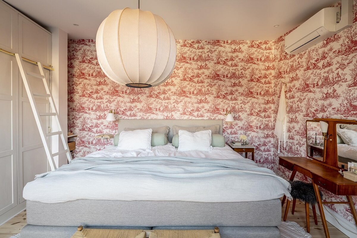 A Swedish Maisonette with a Blue Kitchen and Wallpaper 17 bedroom-pink-wallpaper-built-in-cabinets-vanity-table-nordroom