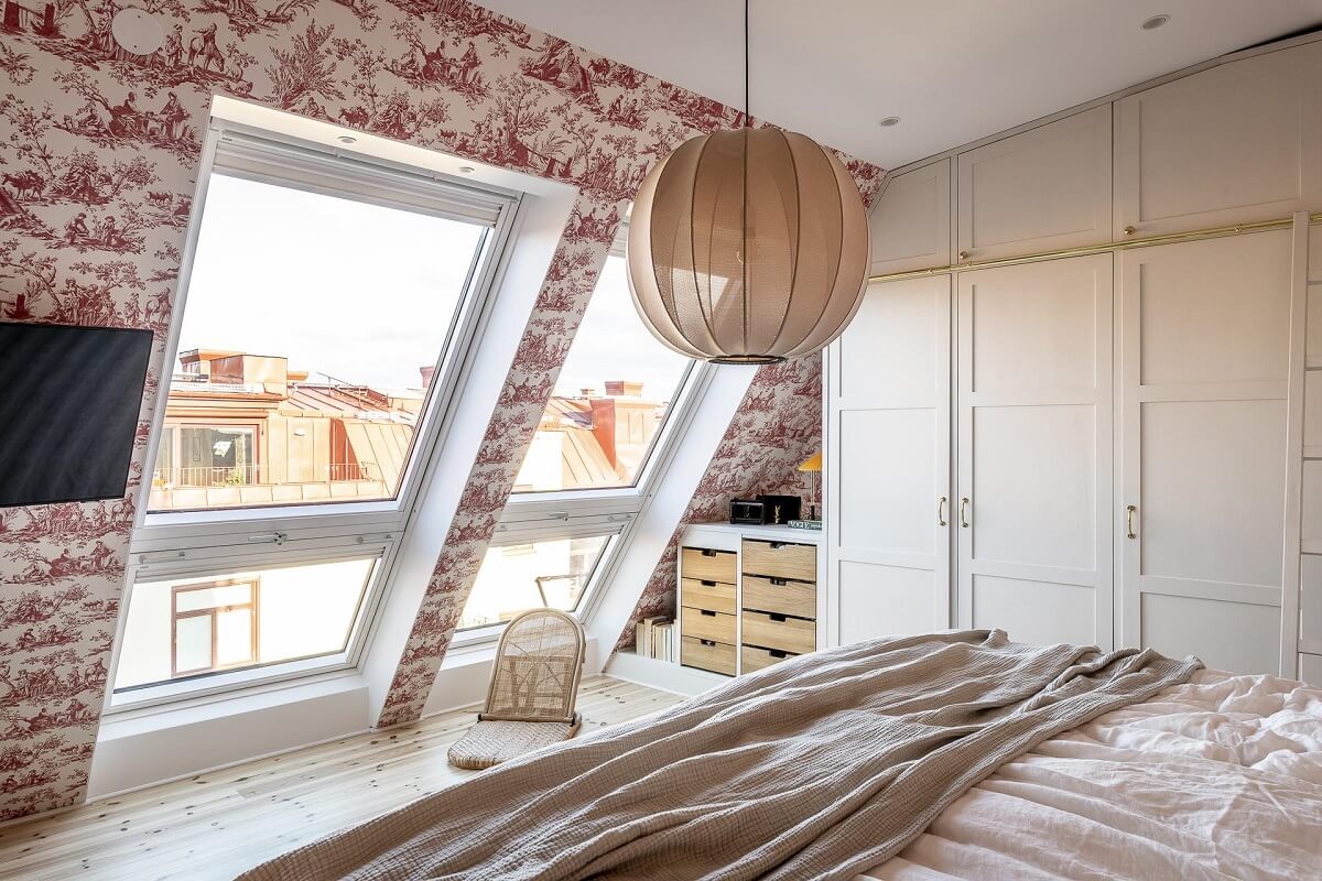 A Swedish Maisonette with a Blue Kitchen and Wallpaper 16 bedroom-slanted-ceiling-wallpaper-nordroom