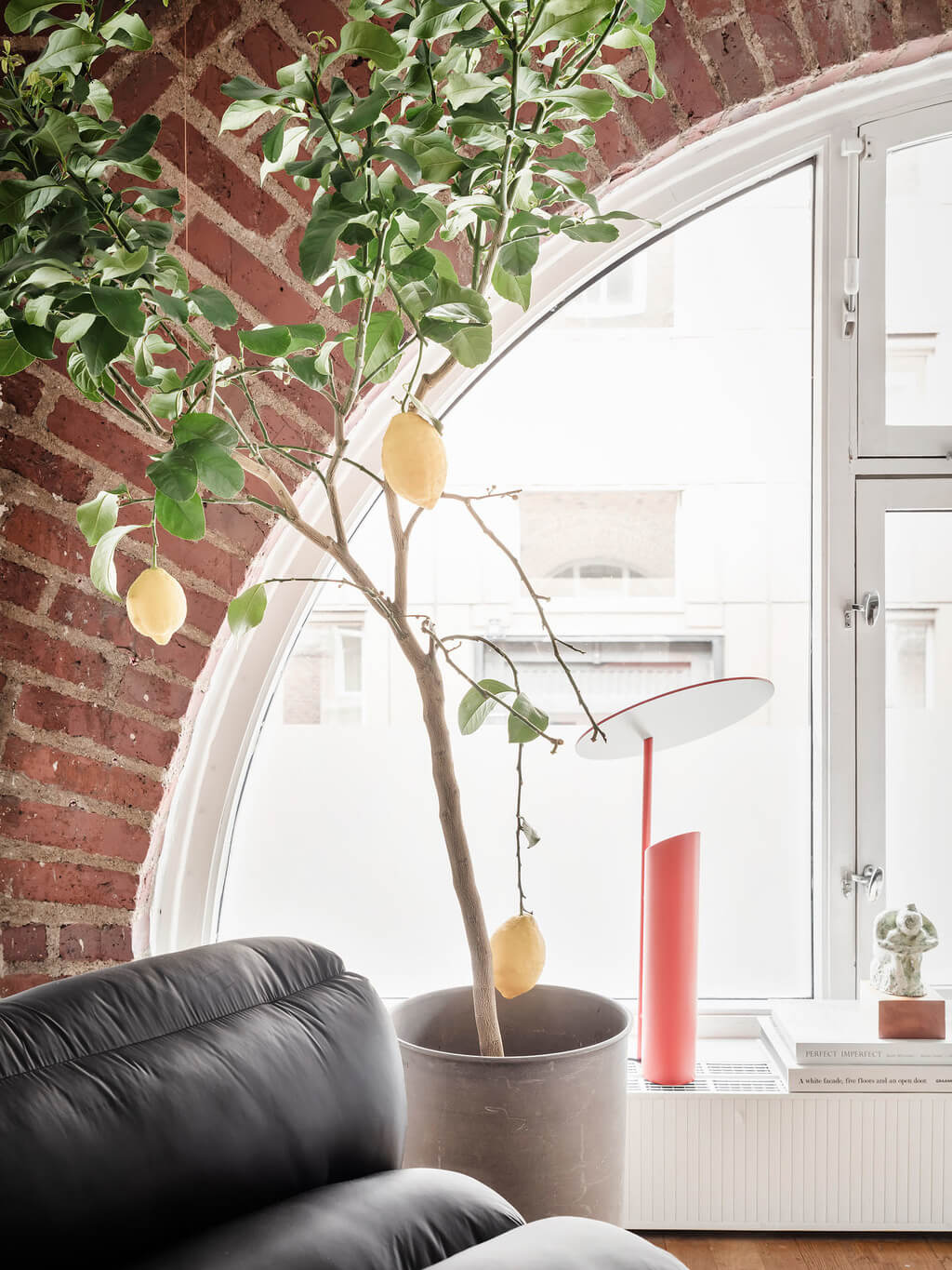 A Scandinavian Loft with Brick Wall and Arched Window 9 brick-wall-arched-window-detail-nordroom