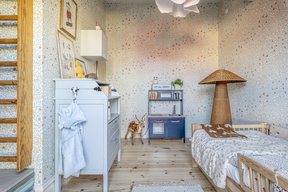 A Swedish Maisonette with a Blue Kitchen and Wallpaper 34 children-room-tree-wallpaper-wooden-floor-nordroom