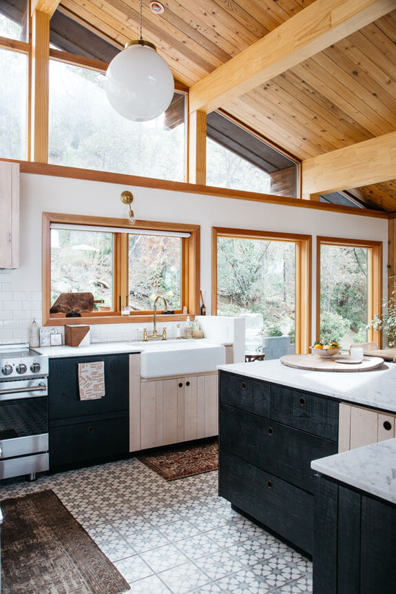 57 Stylish Two-Tone Kitchen Cabinet Ideas 59 dark-blue-beige-kitchen-cabinets-wooden-ceiling-nordroom