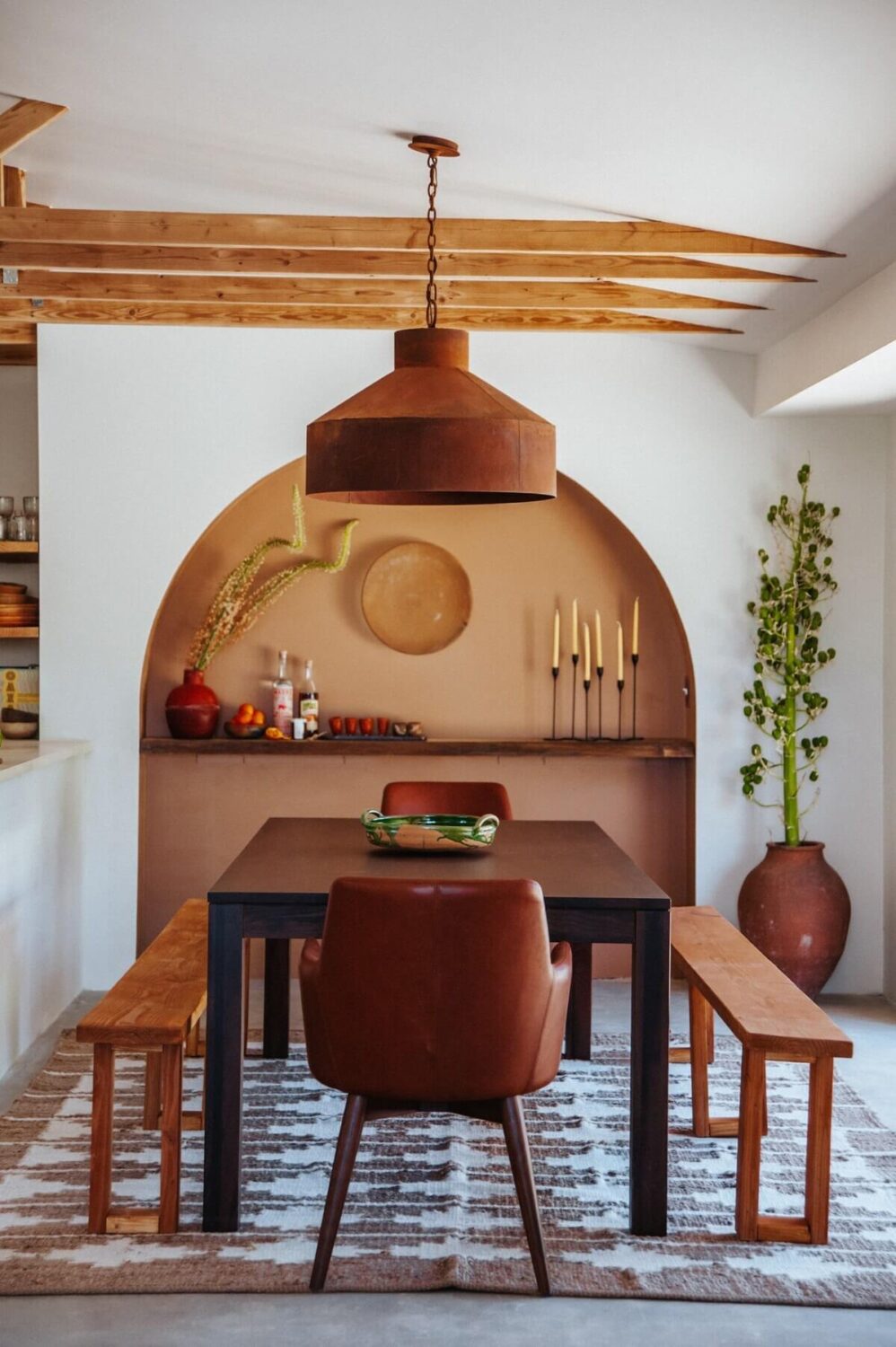 A Colorful Airbnb Home in the Morongo Valley 6 dning-room-painted-arched-niche-exposed-wooden-beams-airbnb-nordroom