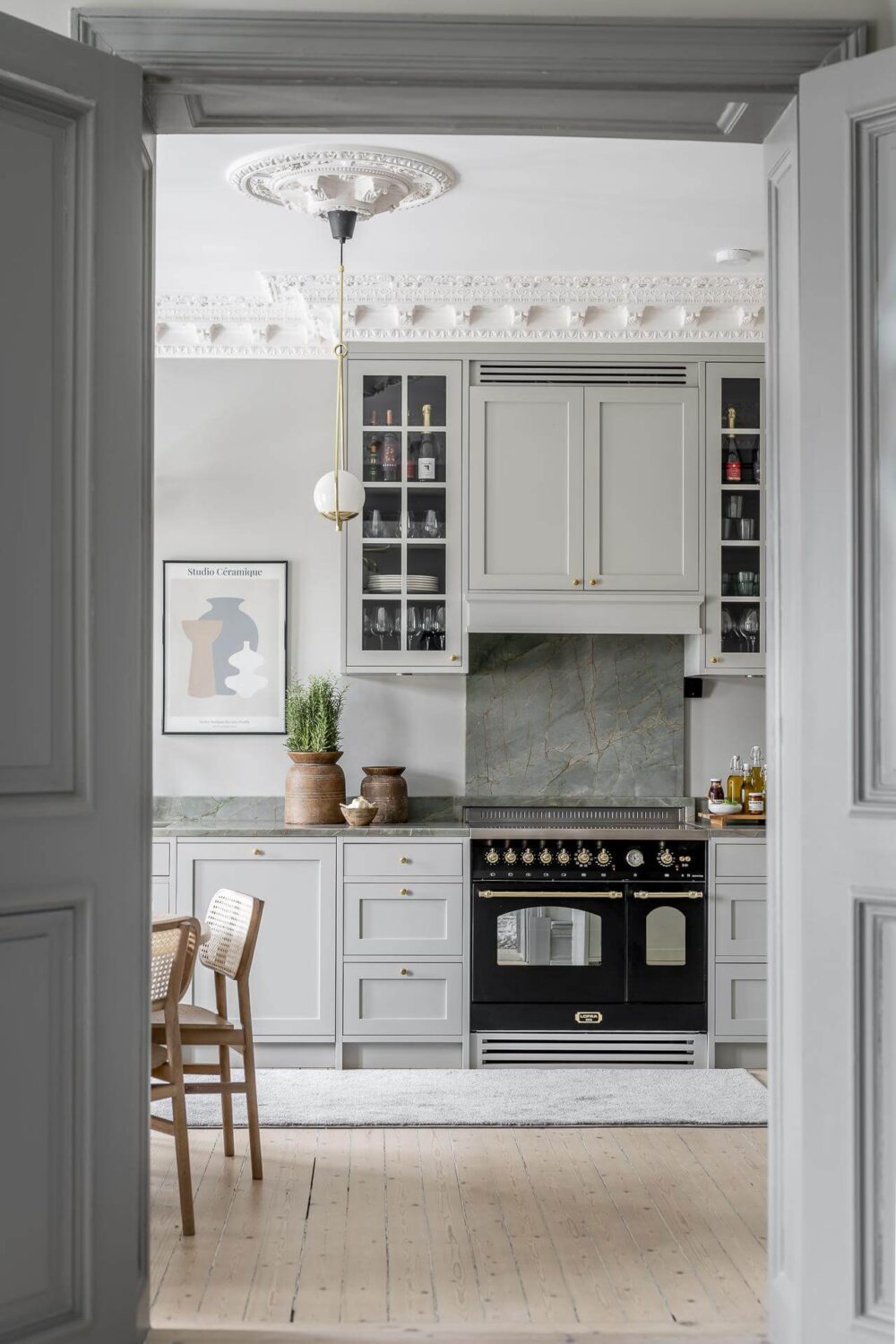 Gray Tones in a Classic Historic Scandinavian Home 14 double-doors-gray-shaker-style-kitchen-nordroom