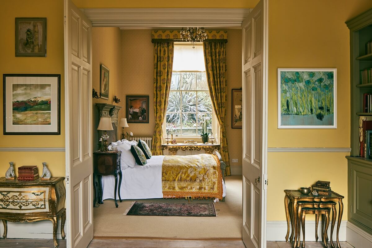 Colorful Rooms and Unique Decor in a Home in Bath 6 double-doors-master-bedroom-antique-furnishings-nordroom