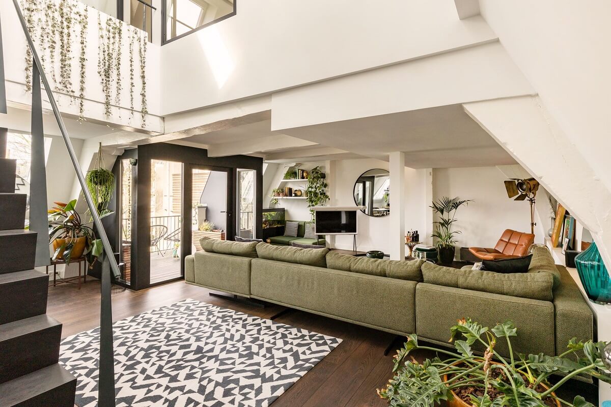 An Amsterdam Penthouse with Green Color Accents 2 double-height-living-space-penthouse-nordroom