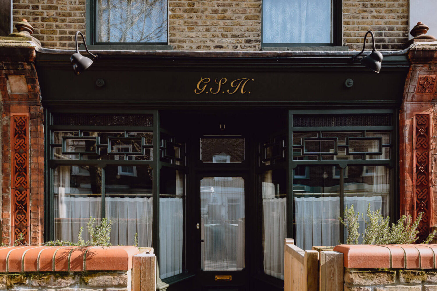 A Victorian Watch Shop is Now a Warm Sustainable Home 26 facade shop window victorian nordroom
