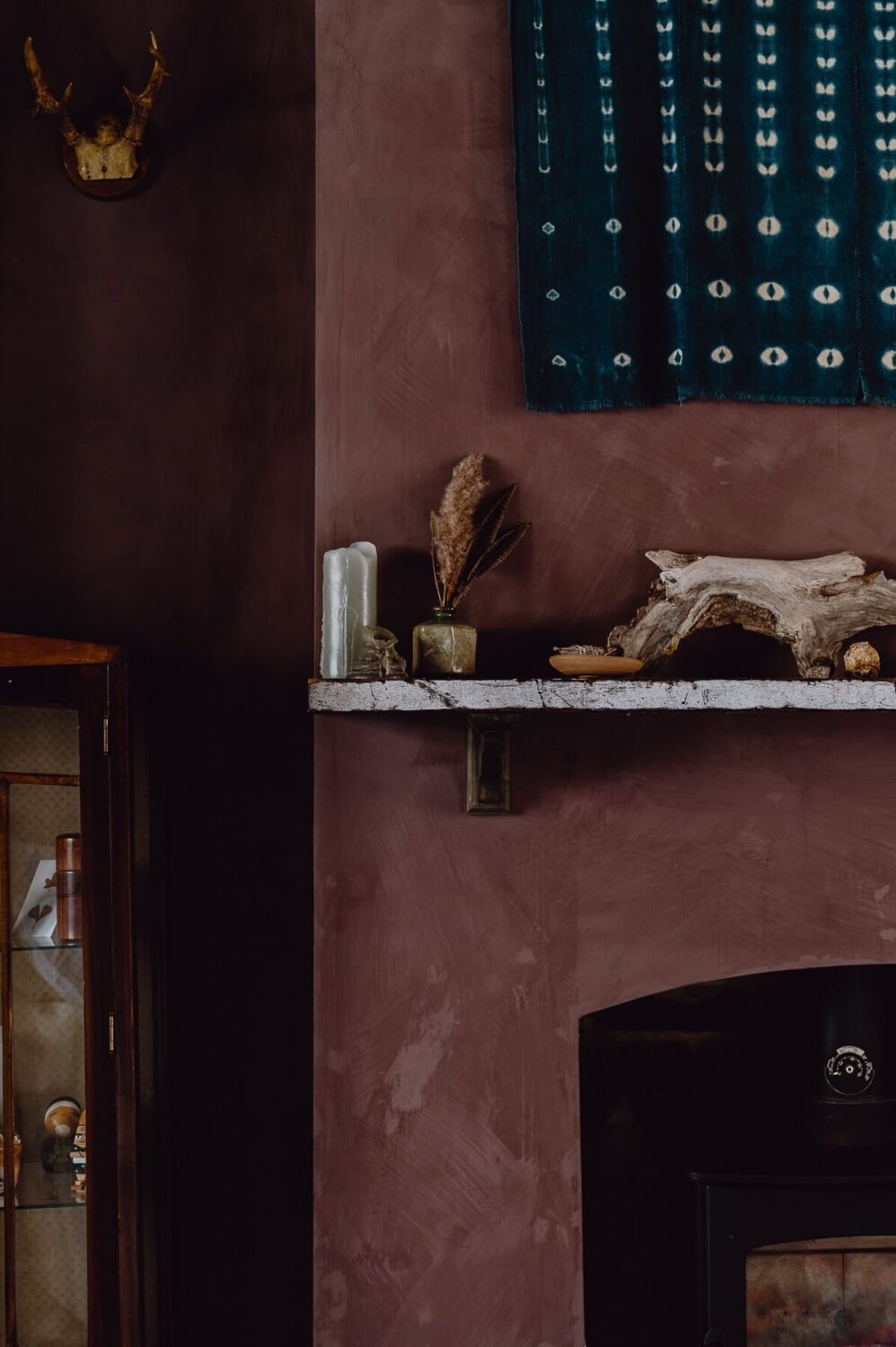 A Victorian Watch Shop is Now a Warm Sustainable Home 8 fireplace-detail-shelf-plum-walls-nordroom