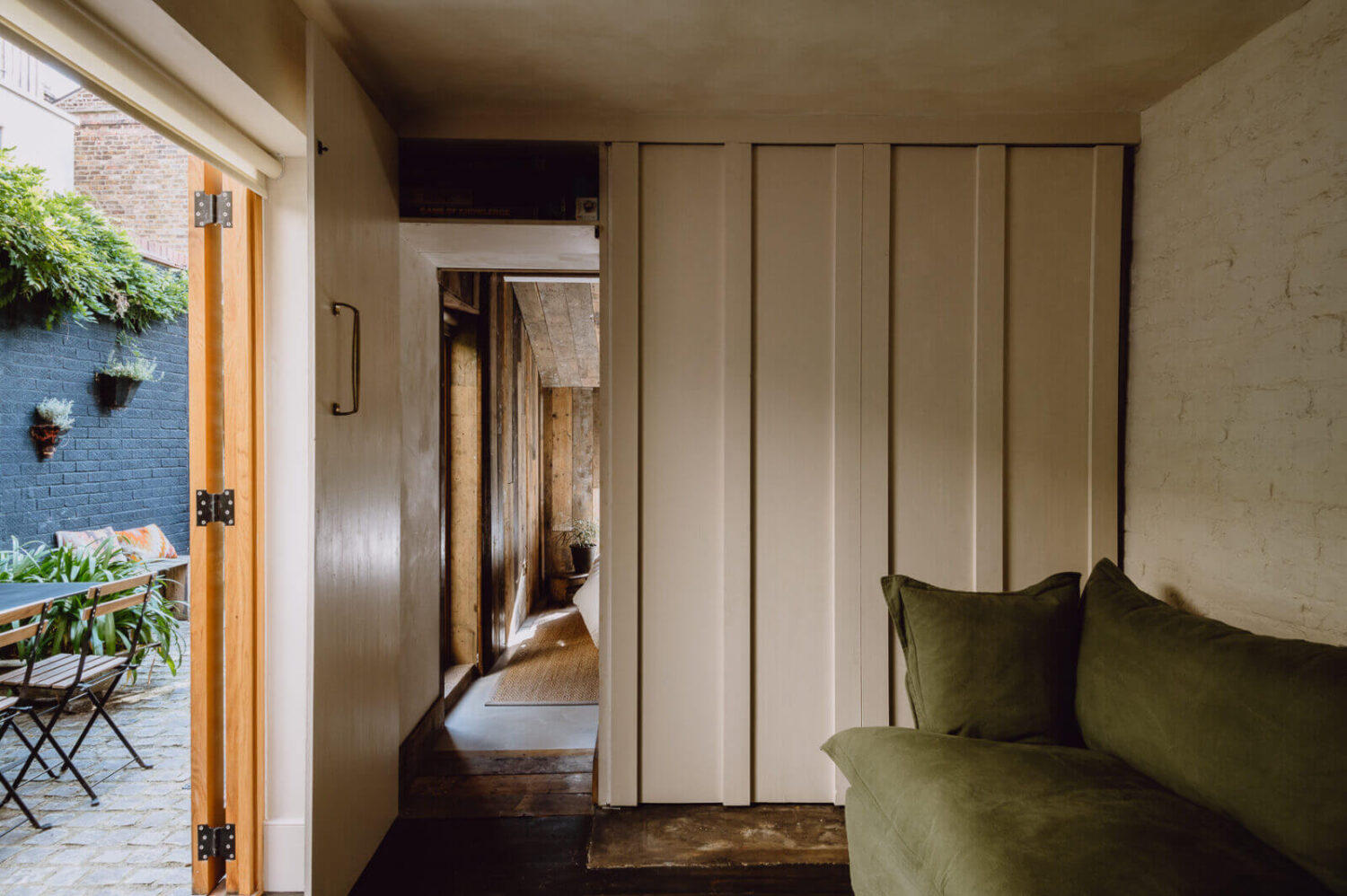 A Victorian Watch Shop is Now a Warm Sustainable Home 9 garden-room-historic-home-london-nordroom