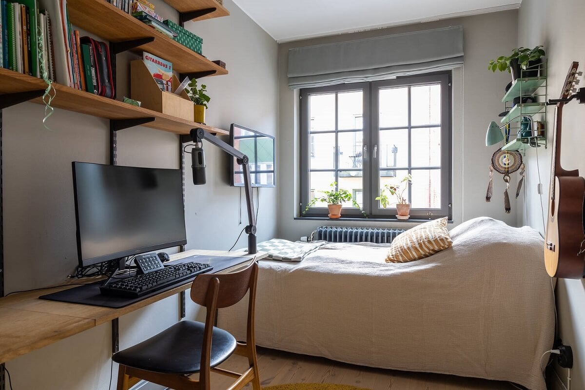 A Swedish Townhouse with a Light Green Kitchen 14 gray-bedroom-desk-shelves-nordroom