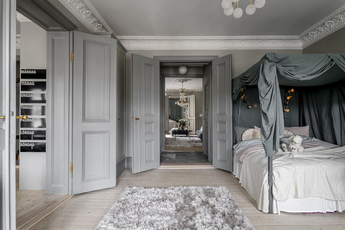 Gray Tones in a Classic Historic Scandinavian Home 26 gray-kids-bedroom-canopy-bed-nordroom
