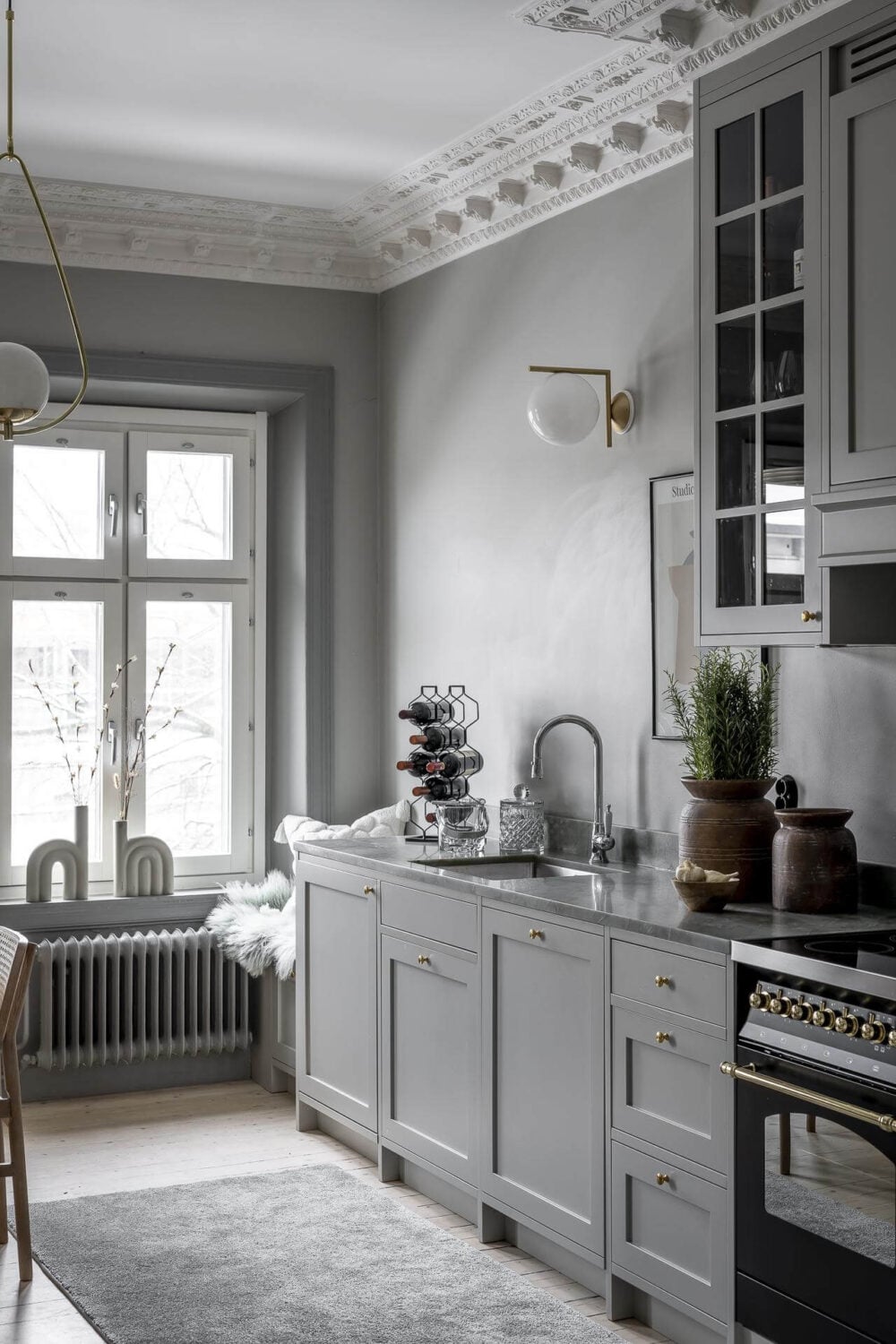 Gray Tones in a Classic Historic Scandinavian Home 17 gray-kitchen-cabinets-walls-classic-home-nordroom