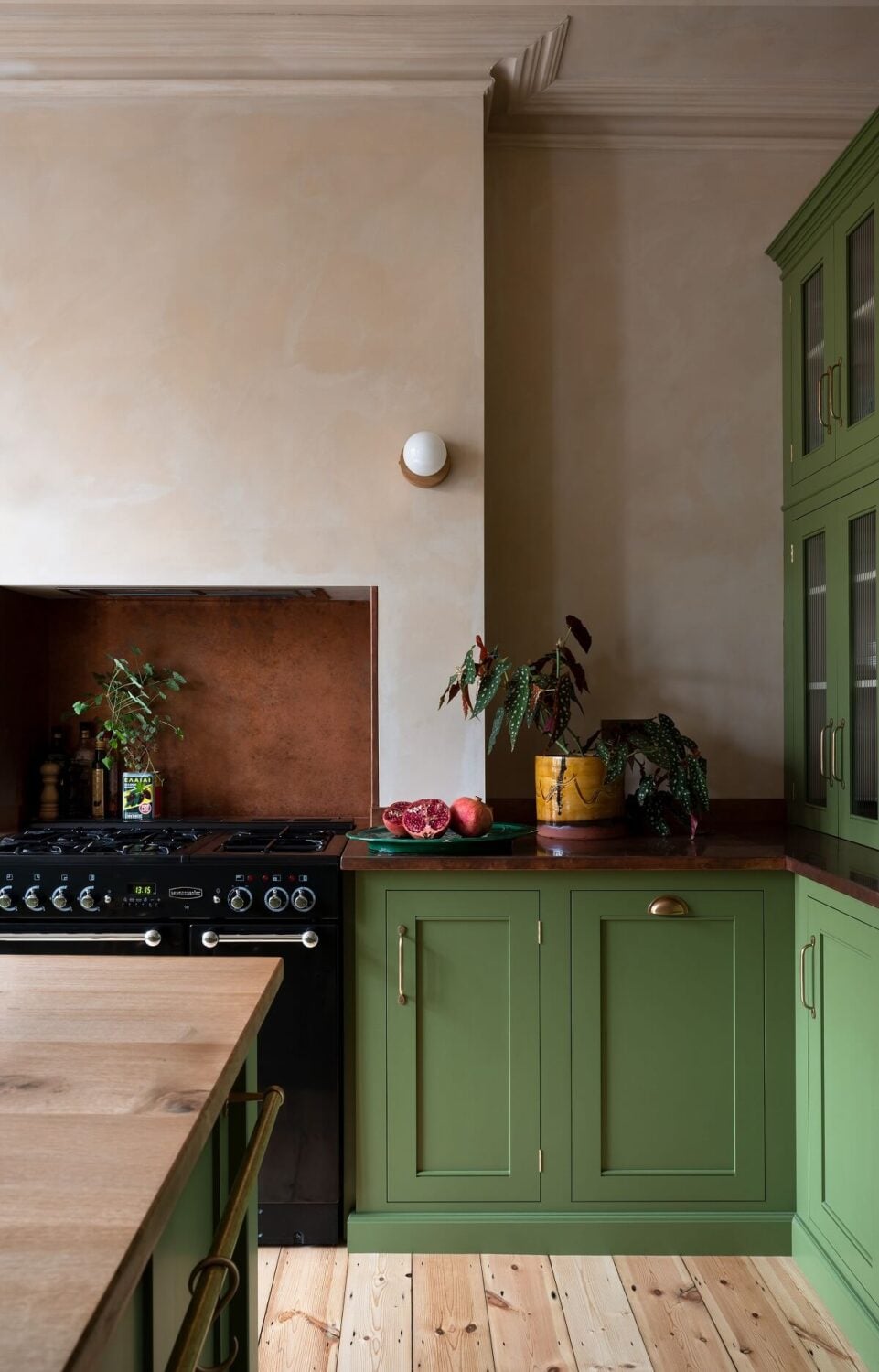 A Green deVOL Kitchen Combined with Plaster Pink Walls 3 green-kitchen-cabinets-wooden-floor-nordroom