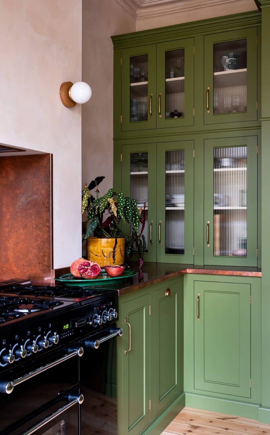 Colorful Kitchen Designs That Brighten Up Your Home 27 green-ribbed-glass-kitchen-cabinets-devol-nordroom