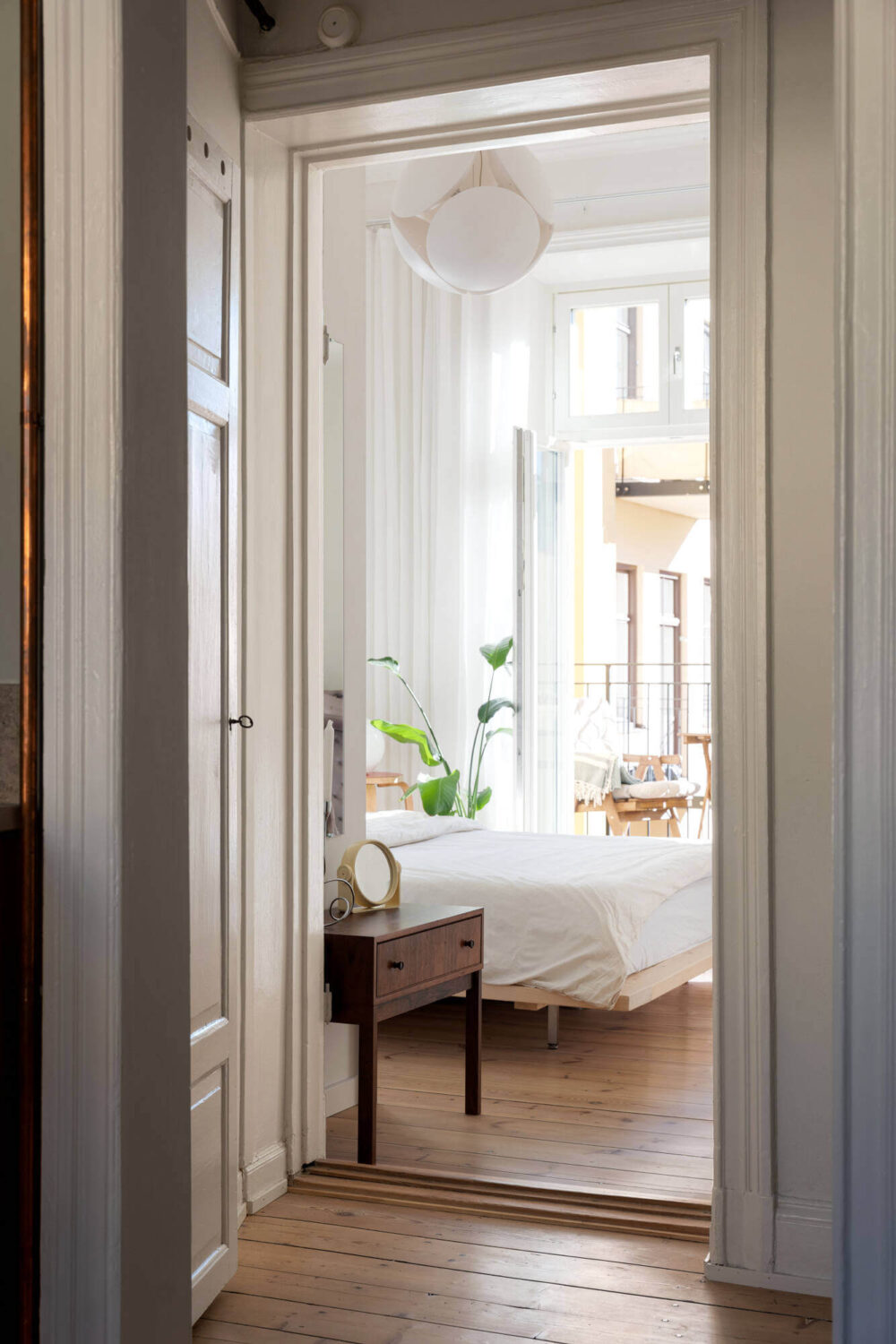 A Small Stockholm Apartment with Lovely Natural Light 9 hallway white bedroom wooden floor nordroom